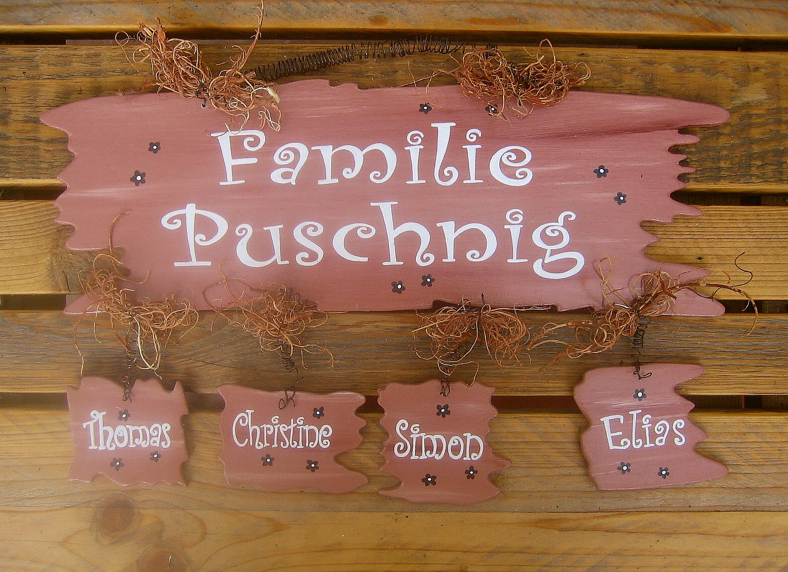 Trschild fr Familien in frhlichem Design