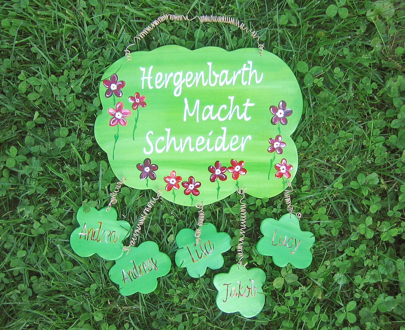 frhliches_Trschild_im_Bltenstil_fr_Patchworkfamilien